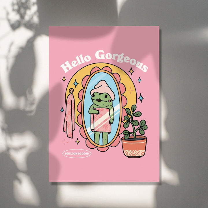 Lifestyle shot of wall art in a dorm room or bathroom setting with pink tones