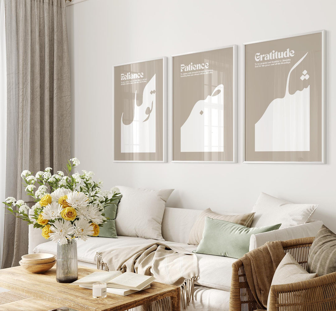 Framed Sabr Shukr Tawakkul prints above a console table, minimalist home decor styling