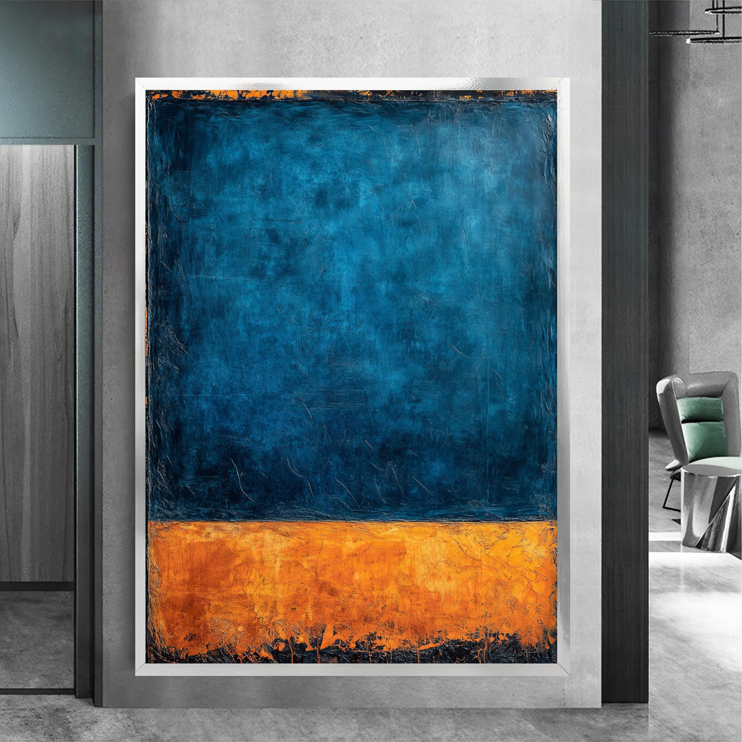 Close-up view of blue and orange brushwork on canvas