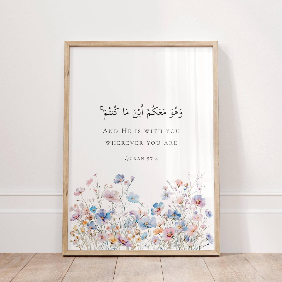 Quran Quote 57:4 Islamic wall art with floral border on white background