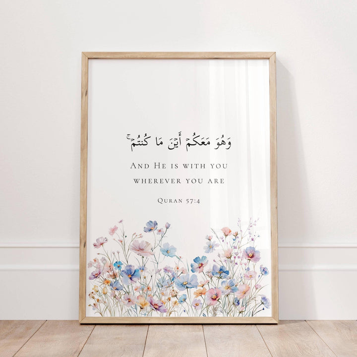 Quran Quote 57:4 Islamic wall art with floral border on white background