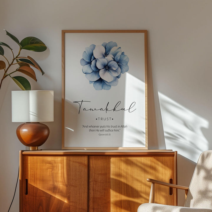 Living room setup with navy Tawakkul wall art