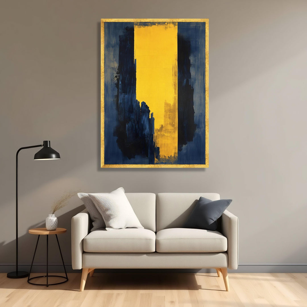 Close-up of bold navy and yellow shapes on a gallery wrapped canvas