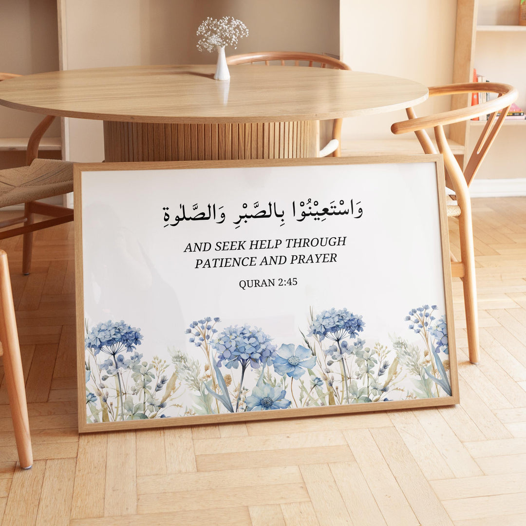 Front view of framed Quran verse wall art in softly lit space