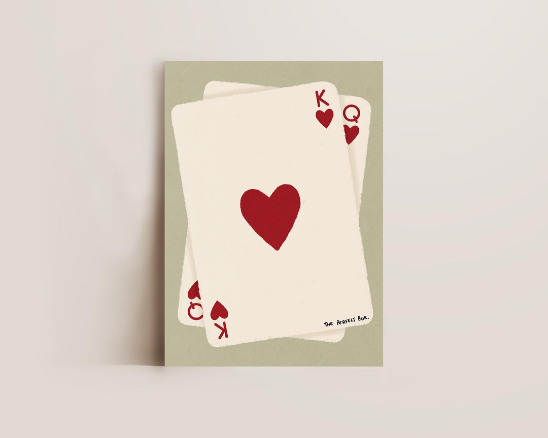 Above-bed art print with heart playing cards for couples