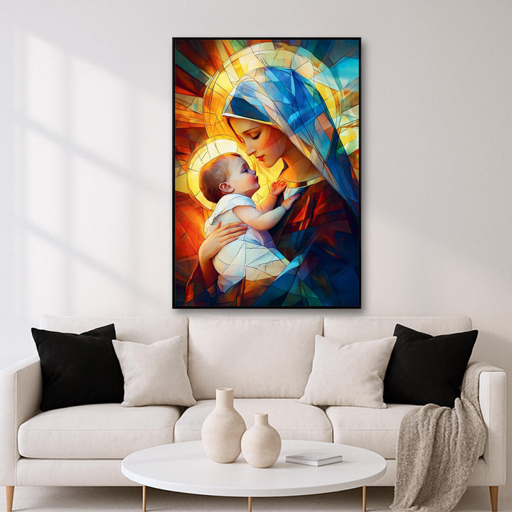 Framed Mary and Jesus wall art displayed above a console in a living room setting