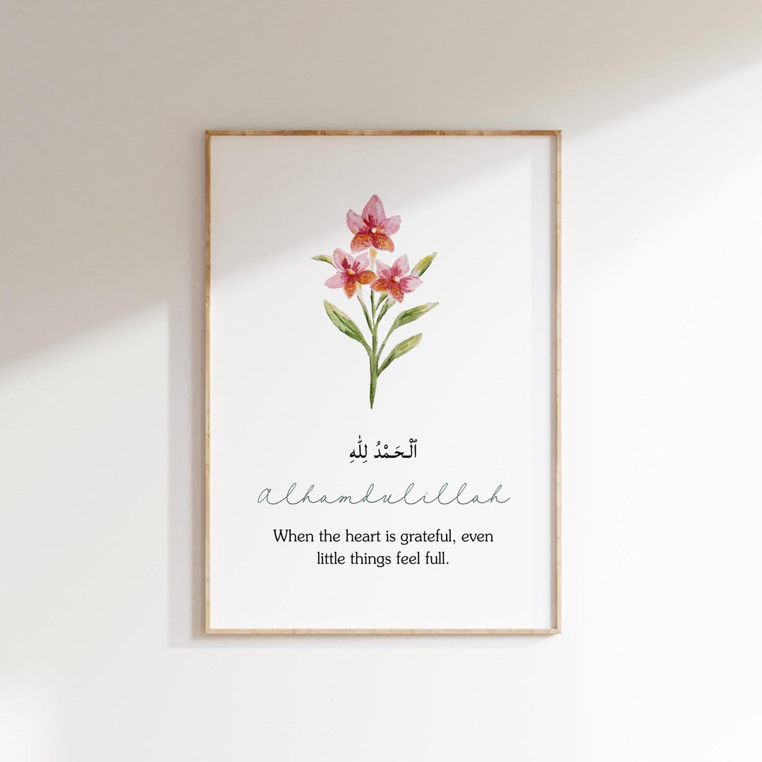 Close-up of Arabic calligraphy with a pastel floral motif