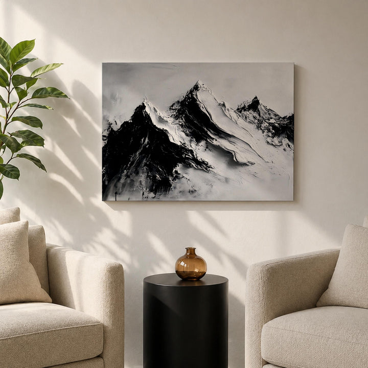 Nordic inspired mountain wall art hanging over sofa