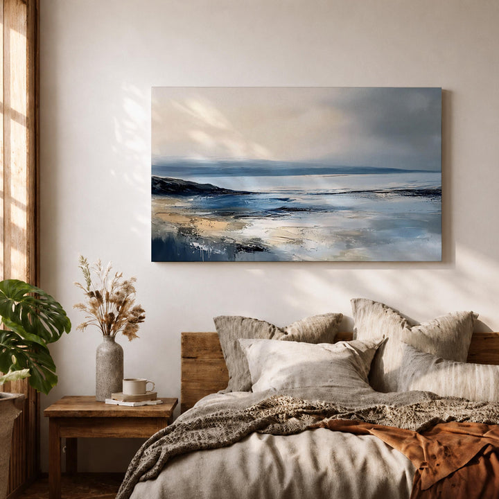 Gallery-framed coastal art with blue sky and water tones